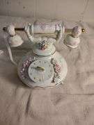 Telephone and teapot music box figurines