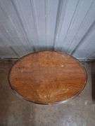 Small oval carved wood table