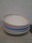 Anchor hocking divided plates, Rubbermaid trays, and wheatstraw plates and cups. 7e