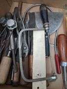 Box lot tools: chisels, saw blades, bits, and more. 2d