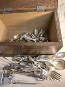 Wood chest with silverware