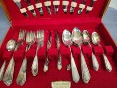 Wm. Rogers Oneida silverware in case