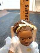 Anika doll in rocking chair- signed, numbered and dated
