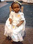 Anika doll in rocking chair- signed, numbered and dated