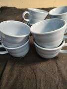 Blue Fiesta 8 cups and 8 saucers