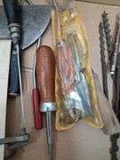 Box lot tools: chisels, saw blades, bits, and more. 2d