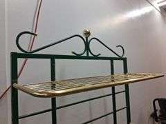 Green and gold metal shelf