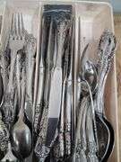 Cutlery organizer full of Oneida community forks/spoons/ knives. 3c