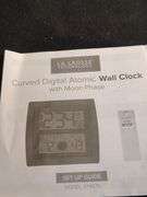 La Crosse curved digital atomic wall clock with moon phase has remote