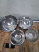 Small pyrex and fire king glass bowls and metal mixing bowls. 3d