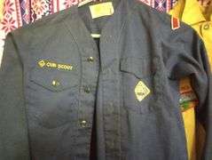 3 Boy Scout shirts and 1 pair of pants