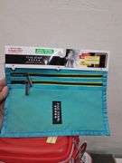 Nwt first aid bags, pencil pouch, and packing pouches. 1c