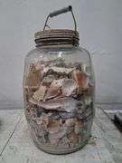 Large glass jar full of shells. 1c