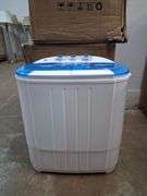 NIB Compact washing machine. BIN $50