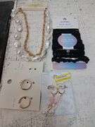 Nos jewelry and hair ties. 2c