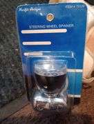 Steering wheel spinner new in package