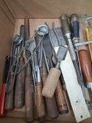 Box lot tools: chisels, saw blades, bits, and more. 2d