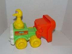 Sesame Street Big Bird Dump Truck and Wind-up Radio (works)