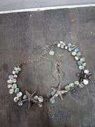 Six necklaces. 1d