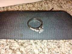 925 ring, i think its a size 11 its big this one very nice looking, maybe stones on side missing?