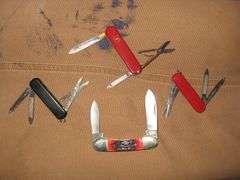 4 KNIVES-3 SWISS ARMY & A CHIEF KNIFE