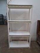 White Plano plastic shelves