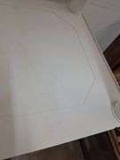 White Plano plastic shelves