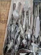 Cutlery organizer full of Oneida community forks/spoons/ knives. 3c