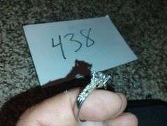 925 ring, i think its a size 11 its big this one very nice looking, maybe stones on side missing?