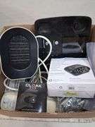 Box lot: home tech with alarm clock, cords, mini camera, and more. 2e