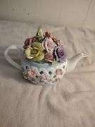 Telephone and teapot music box figurines