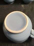 Blue Fiesta 8 cups and 8 saucers