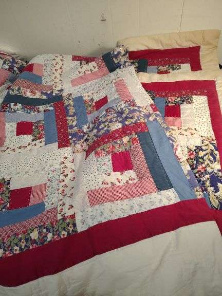 Antique quilt with matching pillowcases