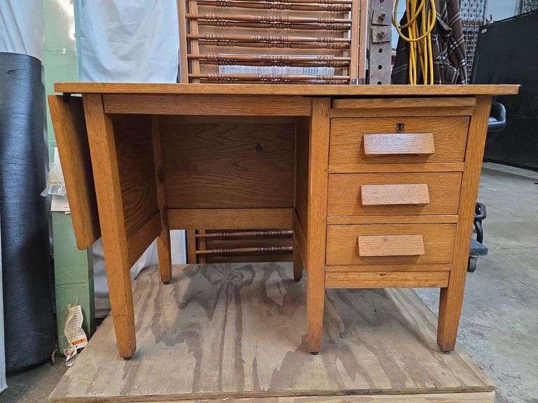 Oak desk with drop side, pull out surface, and 3 drawers