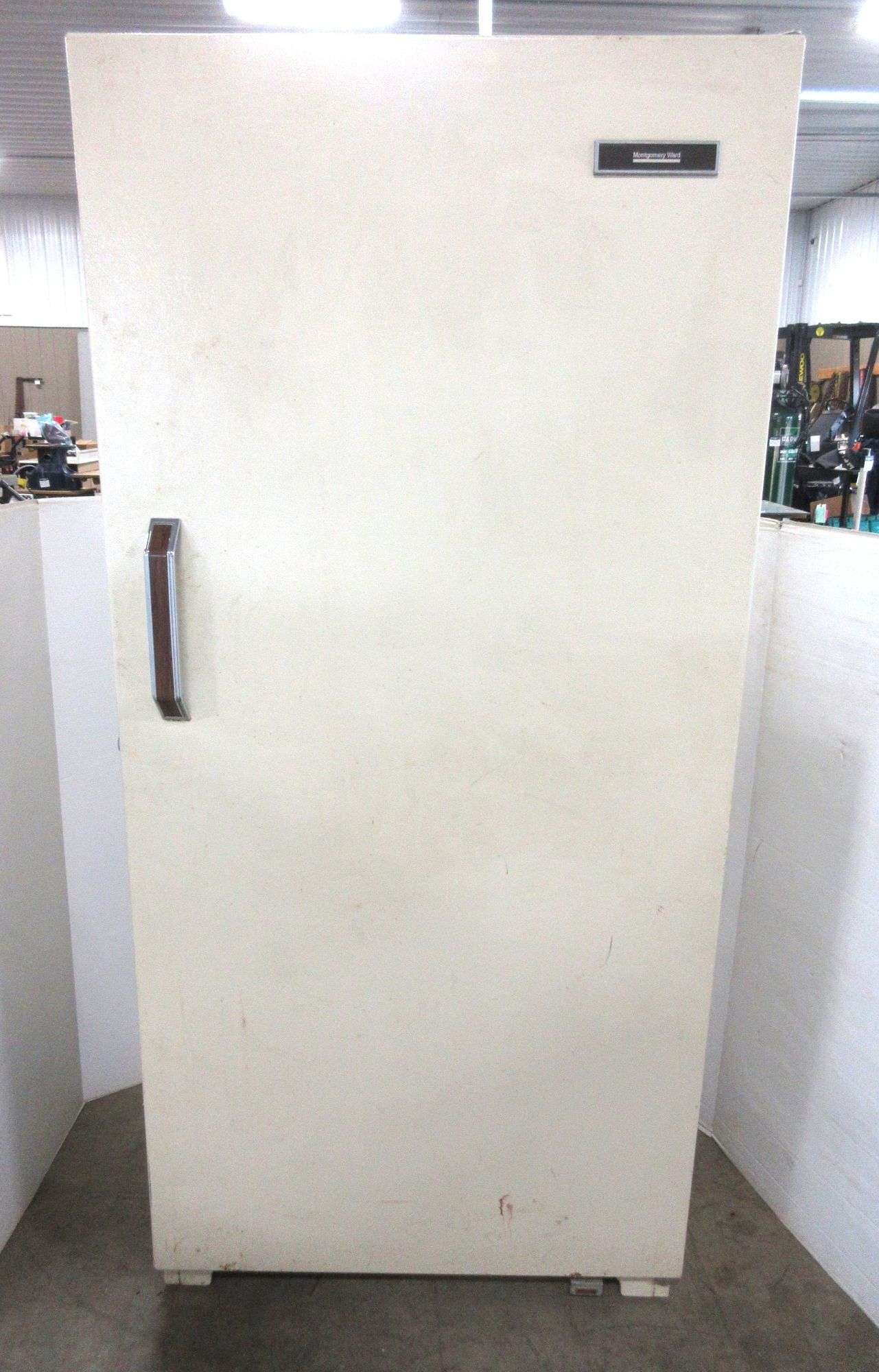 Montgomery-Ward upright freezer, 21.2 cu. ft., works well, model