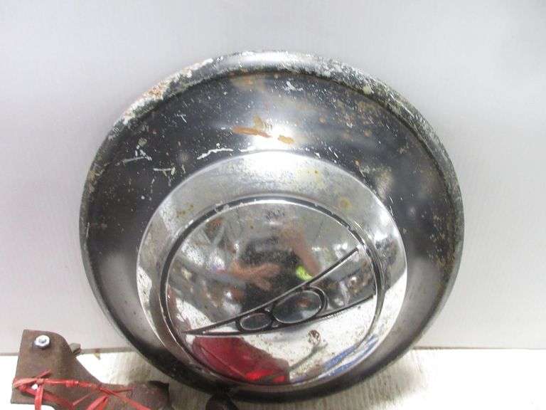 Old Ford car parts, include Ford V8 wheel cover, 13"; Cord tail light
