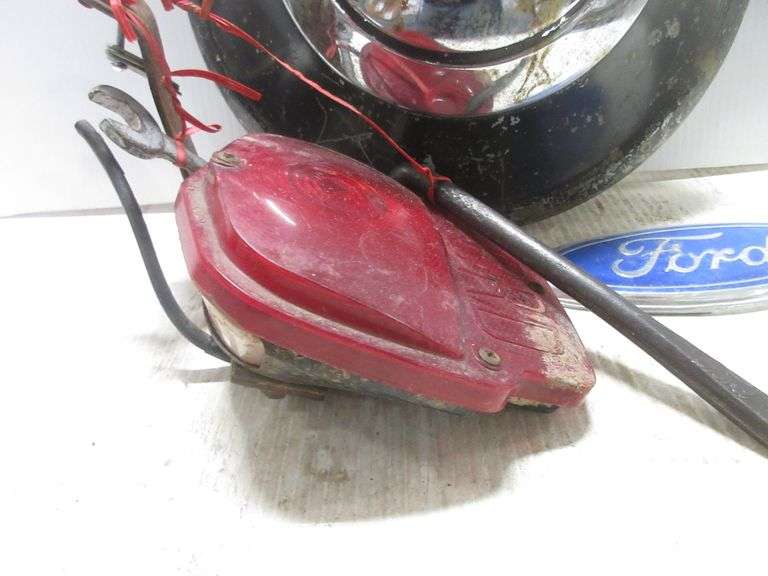 Old Ford car parts, include Ford V8 wheel cover, 13"; Cord tail light
