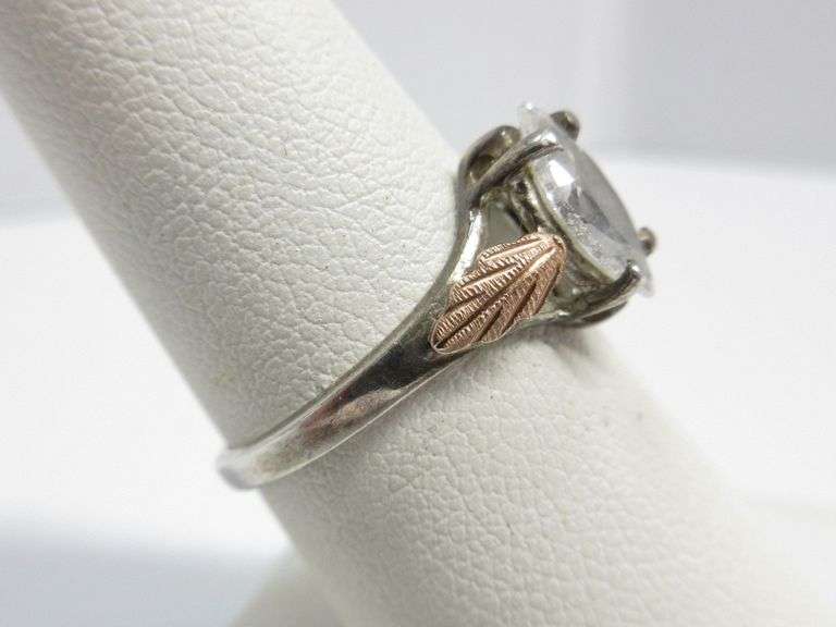 Sterling and 12K gold ring with diamond look stone, size 7 1/2, marked