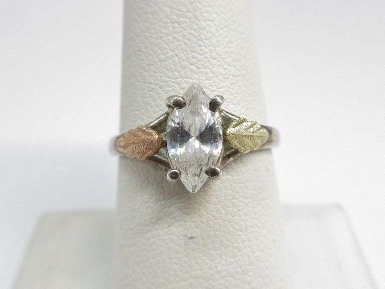 Sterling and 12K gold ring with diamond look stone, size 7 1/2, marked