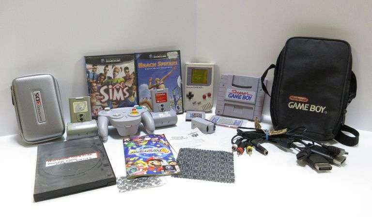 1989 Gameboy system with case, NFL football game, (3) gamecube games ...