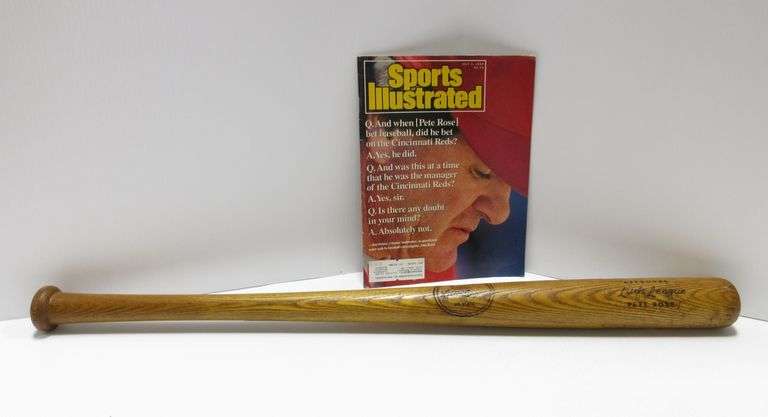 Collectible older Pete Rose little league bat with copy of 1989 Sports ...