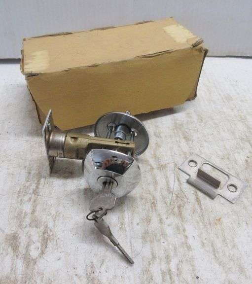 Old lock or deadbolt with key, new Albrecht Auction Service