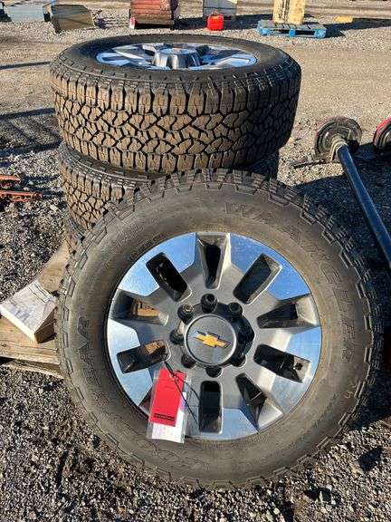 (4) Wrangler tire rims, LT275/65R20, and box - Albrecht Auction Service