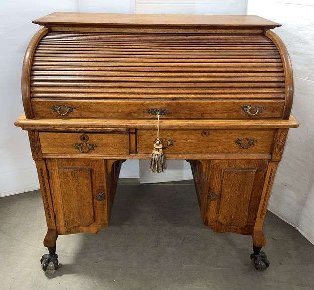 Antique roll-top oak wood desk with eagle legs, 40"W x 27"D x 42"H