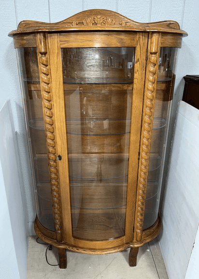 Older lighted cabinet with glass shelves, 40"W x 18"D x 69"H, very nice, back left leg is loose, needs new screws, light wear, comes with key