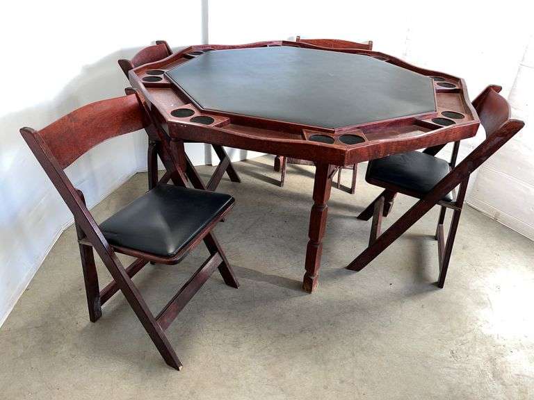 Old poker table with leather top, comes with (4) chairs with leather and wood, 53" x 53", nice, some wear