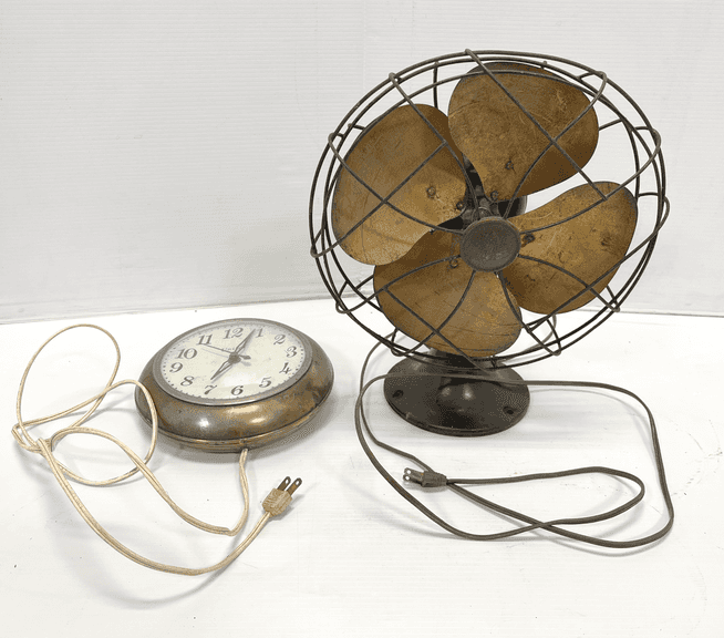 Old brass fan and clock, up to 11