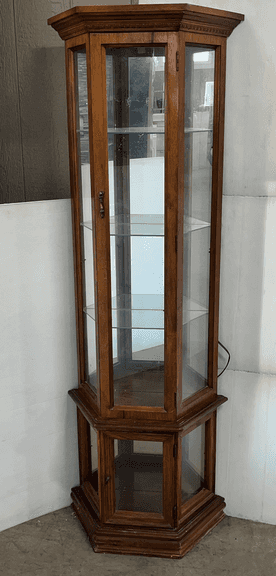 Wood Grain display cabinet with glass shelves, 19"W x 11"D x 72"H, bottom glass piece was broken and removed