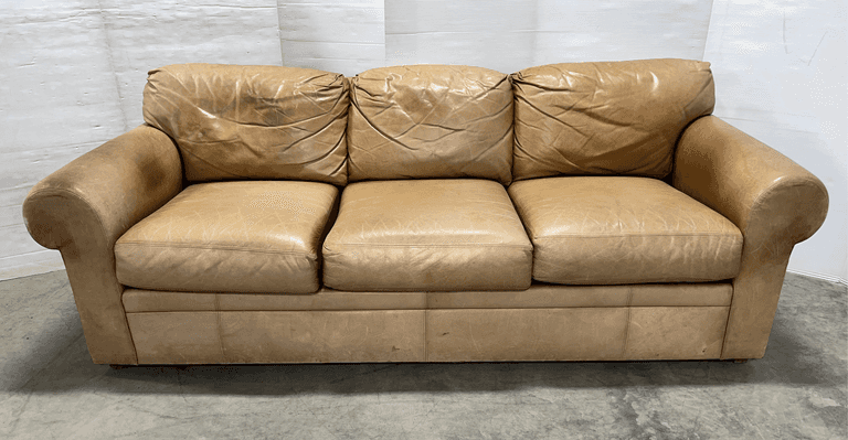 Light brown leather couch, 84"W, worn