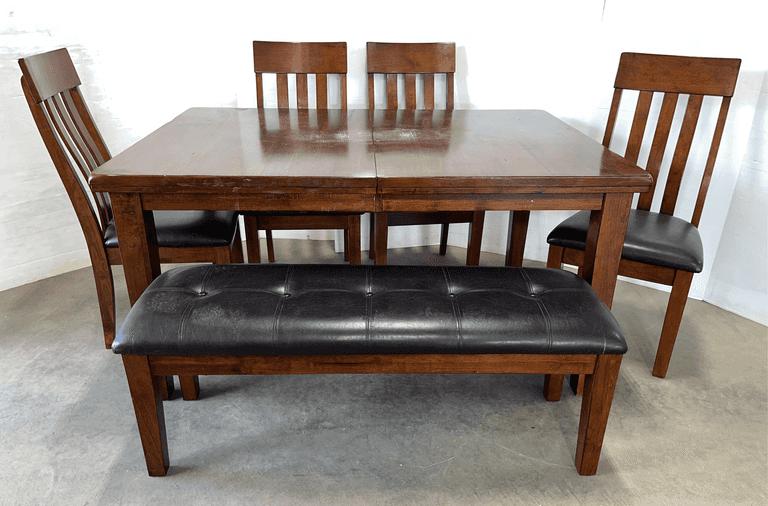 Ashley Furniture dining table with (4) chairs, bench, and self-storing leaves, table- 60"W x 42"D x 30"H, sturdy, has top wear